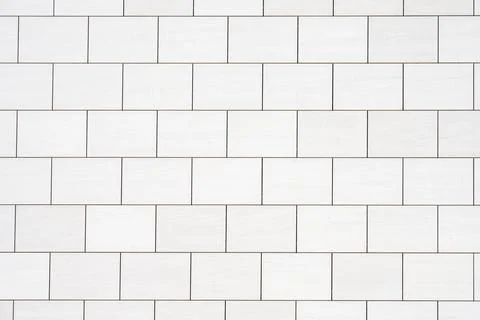 Wall with rectangular white stone slabs Foto stock