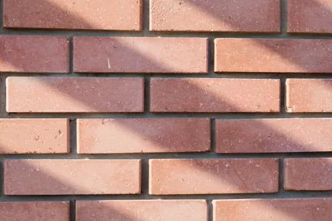 The wall of red brick. Texture, background. Stock Photos