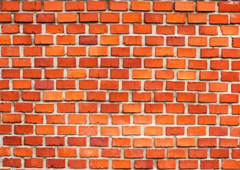 Wall of red bricks Stock Photos