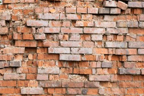 Wall of red bricks. Texture or background of bricks. Stock Photos