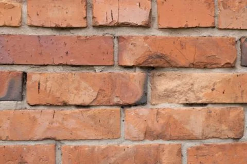 Wall of red bricks. Texture or background of bricks. Stock Photos