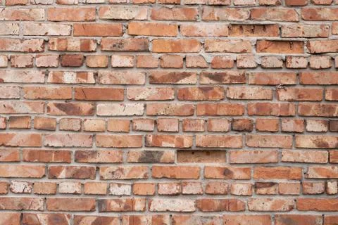 Wall of red bricks. Texture or background of bricks. Stock Photos