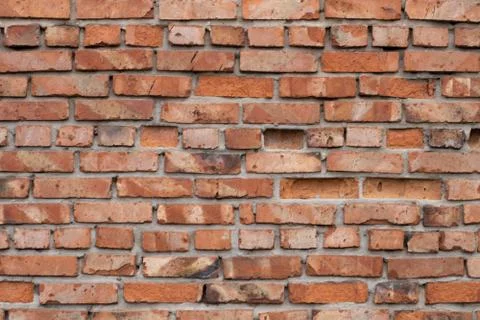 Wall of red bricks. Texture or background of bricks. Stock Photos