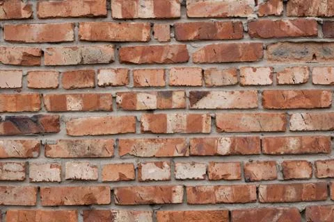Wall of red bricks. Texture or background of bricks. Stock Photos