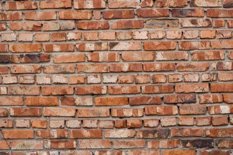 Wall of red bricks. Texture or background of bricks. Stock Photos