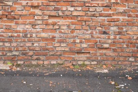 Wall of red bricks. Texture or background of bricks. Stock Photos