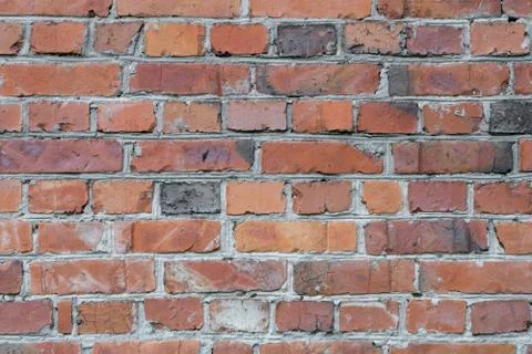 Wall of red bricks. Texture or background of bricks. Stock Photos