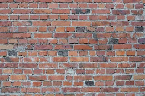 Wall of red bricks. Texture or background of bricks. Stock Photos