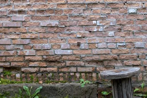 Wall of red bricks. Texture or background of bricks. Stock Photos
