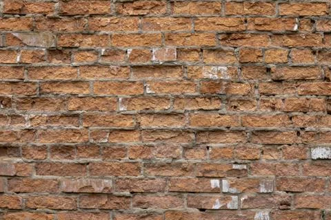 Wall of red bricks. Texture or background of bricks. Stock Photos