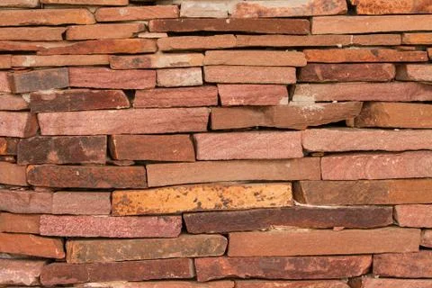 The wall of red stone. Stock Photos