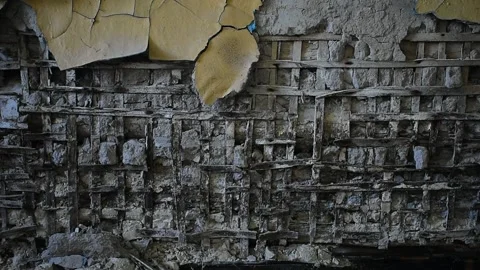 Wall with remains of plaster and paint Stock Footage 138419855