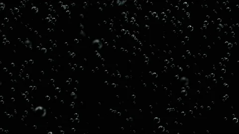 A wall of rising bubbles. Bubbles with carbon dioxide float upwards. Stock Footage 115970715