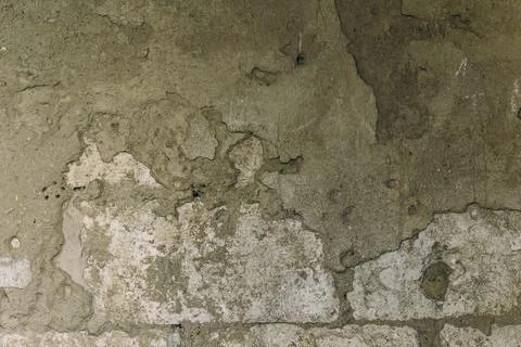 A wall with a rough, textured surface Stock-Fotos