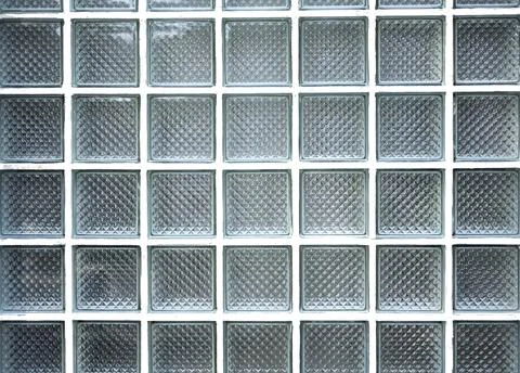 Wall with rows of glass bricks or blocks as texture or background 스톡 사진
