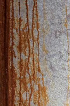 Wall with rust to use as background. Marked, drip. Stock Photos