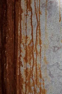 Wall with rust to use as background. Stock Photos