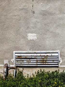 Wall with rusty metal grid Stock Photos
