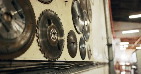 Wall, saw and blades in workshop for carpentry, woodworking and collection for Stock Footage 340610028
