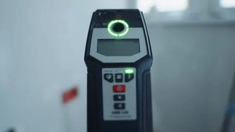 Wall scanner detecting wiring near sockets Video stock 313799726