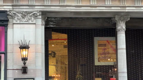 Wall sconces on storefront of New York City building - 4K Prores 422 HQ Stock Footage 233912192