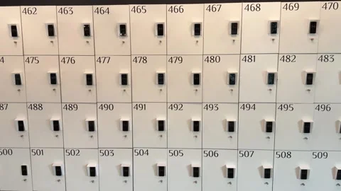 Wall of secure lockers with electronic locks and numbers Stock Footage 318283005