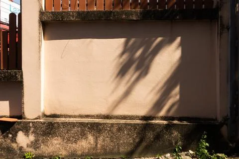 A wall with a shadow on it Foto stock