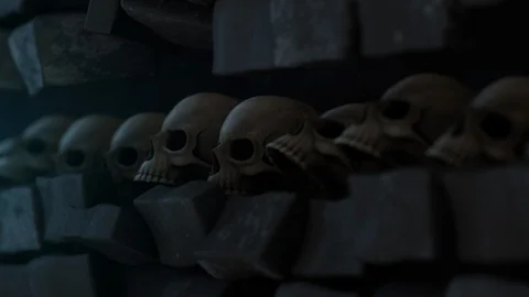 Wall of Skulls with Moving Bricks and Heads Stock Footage 97450507