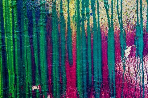 Wall with smudges of multi-colored paint. Stock Photos