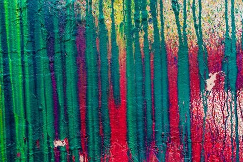 Wall with smudges of multi-colored paint. Stock Photos