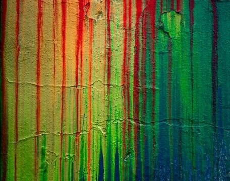 Wall with smudges of multi-colored paint. Stock Photos