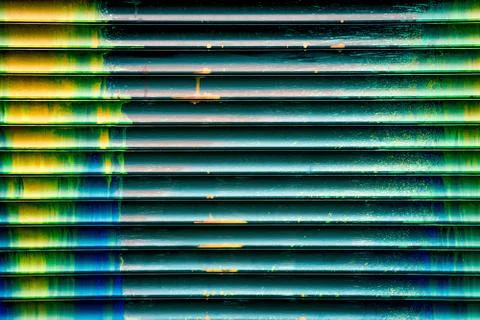 Wall with smudges of multi-colored paint. Stock Photos