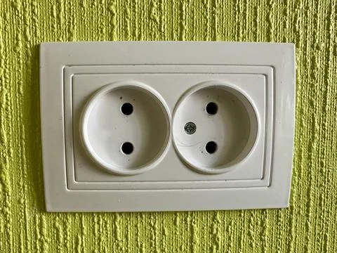 Wall socket with electrical outlet, close-up, modern design Stock Photos