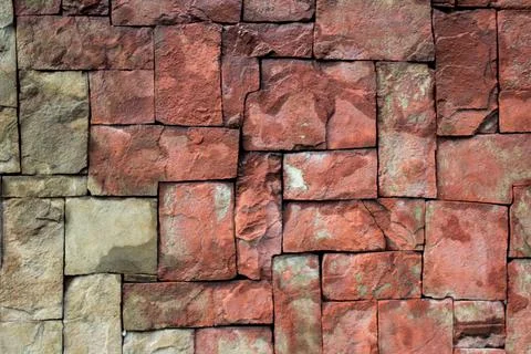 Wall of square stones of different sizes. Rectangular tiles of different sizes Stock-Fotos