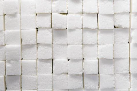 Wall of stacked sugar cubes Stock Photos