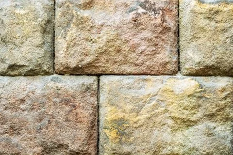 Wall of stone blocks. Stock Photos