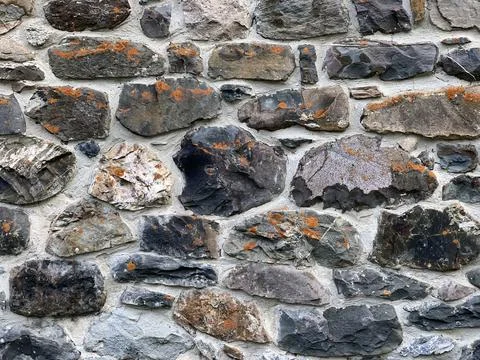 Wall of stone close up, background, texture. Stock Photos