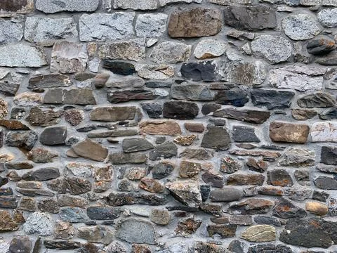 Wall of stone close up, background, texture. Stock Photos