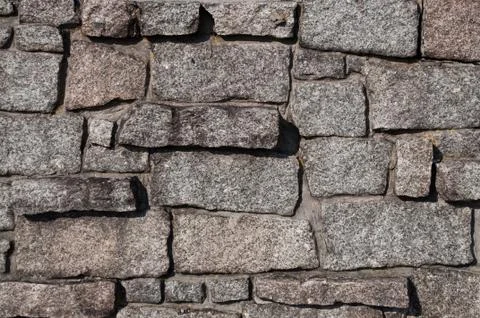 Wall from stone grey blocks Stock Photos