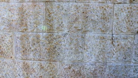 Wall of stone tile Stock Footage 79338087
