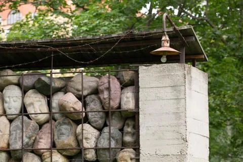 A wall of stones in the shape of human faces  Russia,Moscow 17.08.2024 Stock Photos