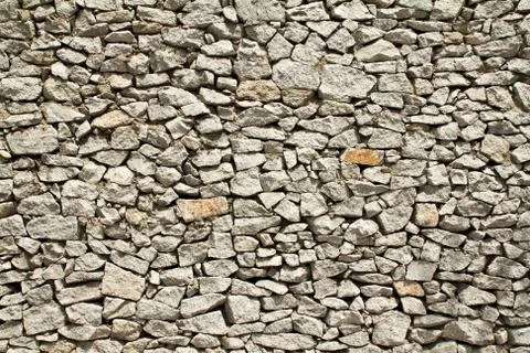 Wall of stones as a texture Stock Photos