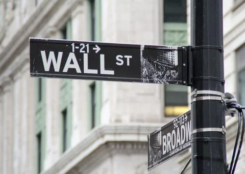 Wall street direction sign Stock Photos