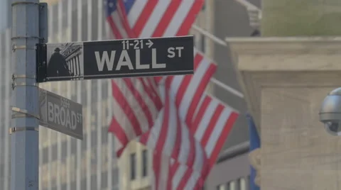 WALL STREET STREET SIGN FLAGS SLOW MOTION Stock Footage