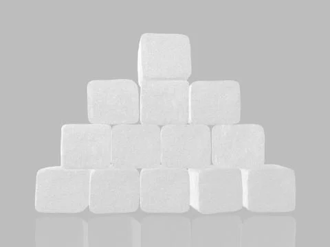 Wall of sugar cubes. Background from pieces of sugar Illustrazione stock