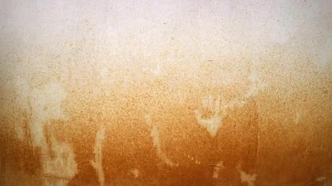 Wall surface featuring a grungy texture and rough pattern. White paint show.. Stock Photos