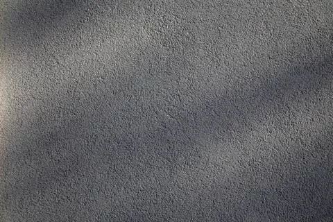 Wall surface with shadows. Stock Photos