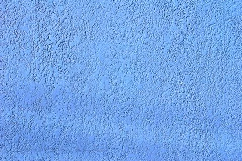 The wall surface is smooth, plastered with blue paint of the main house. Foto stock