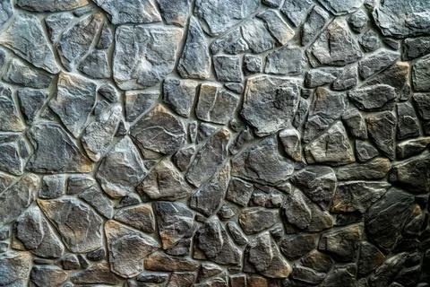 The wall surface, which is closed with granite, arranged beautiful with cement. 스톡 사진