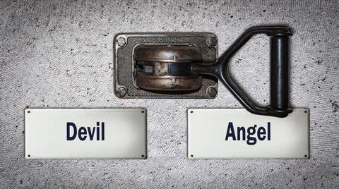 Wall Switch to Angel versus Devil Street Sign the Direction Way to Angel v... 스톡 사진